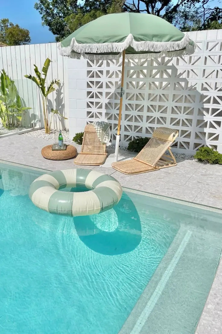a green and yellow buoy in a swimming pool