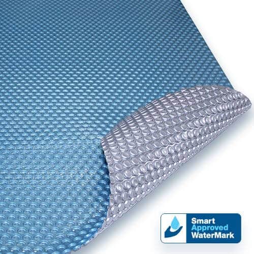 Close-up of a blue and silver solar pool blanket with Smart Approved WaterMark logo