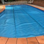 Close-up of the blue bubble-textured Ultra Silverback pool cover