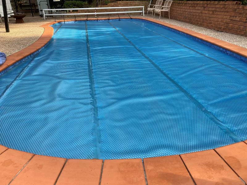 Close-up of the blue bubble-textured Ultra Silverback pool cover