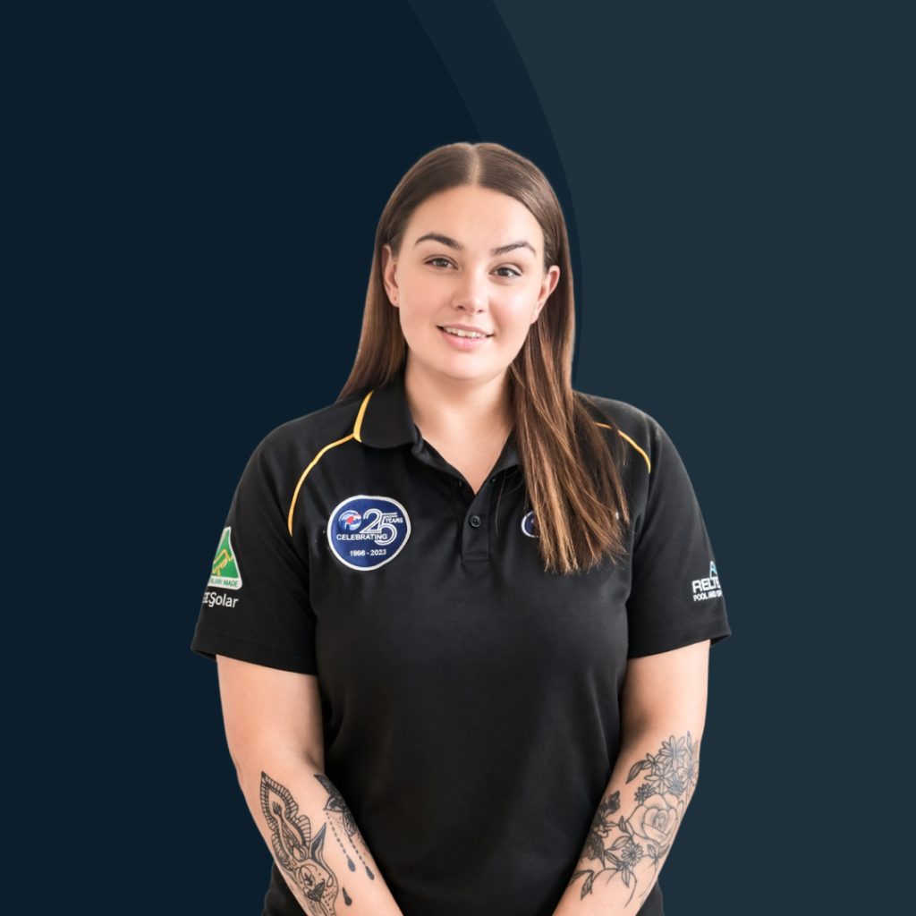 Portrait of an AES staff member wearing a branded polo shirt